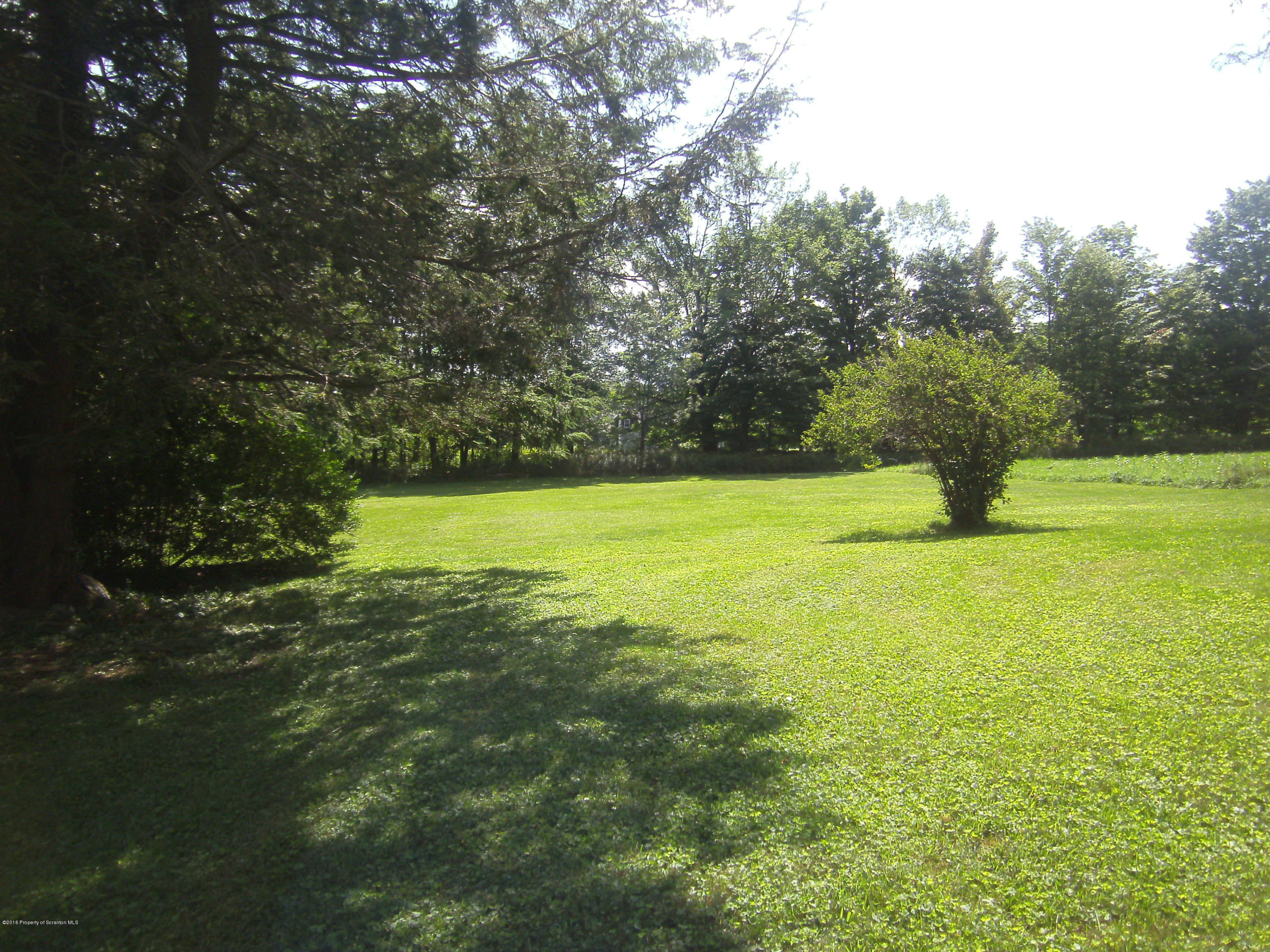 855 Becks Crossing Road Moscow, PA 18444 - Photo 34 of 43 a view of a field with an trees
