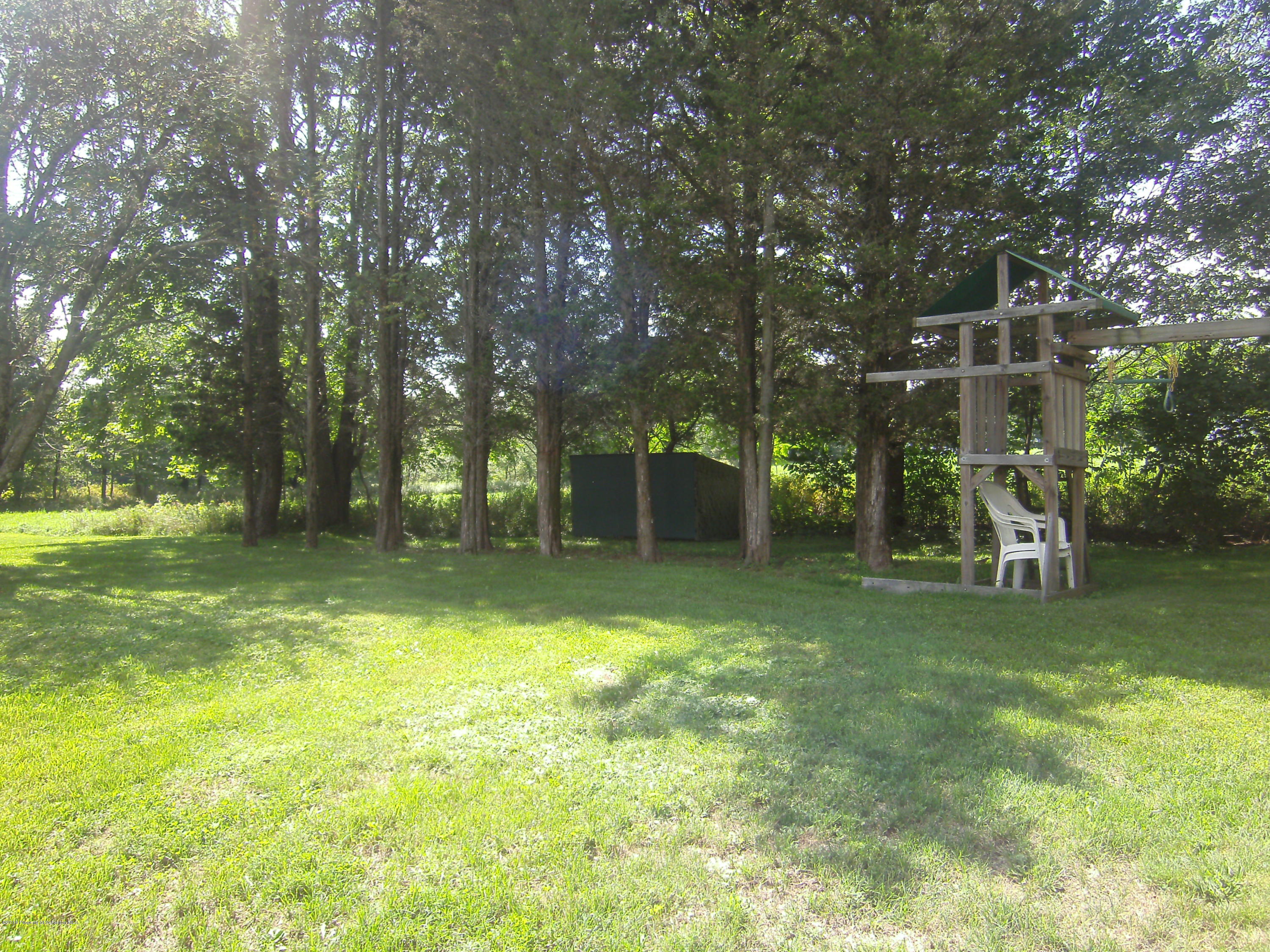 855 Becks Crossing Road Moscow, PA 18444 - Photo 39 of 43 a view of a park with swings