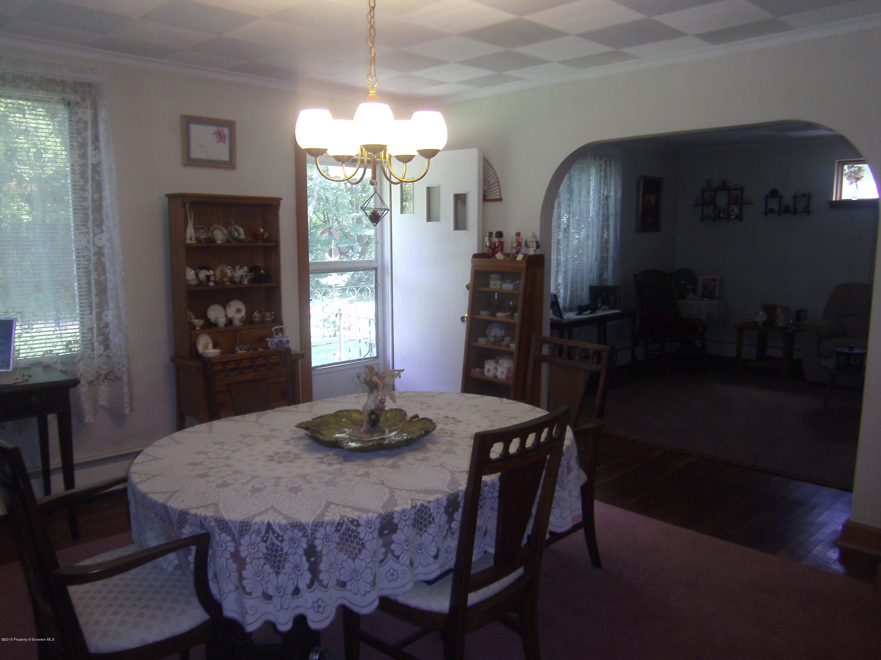 855 Becks Crossing Road Moscow, PA 18444 - Photo 5 of 43 a dining room with furniture and window