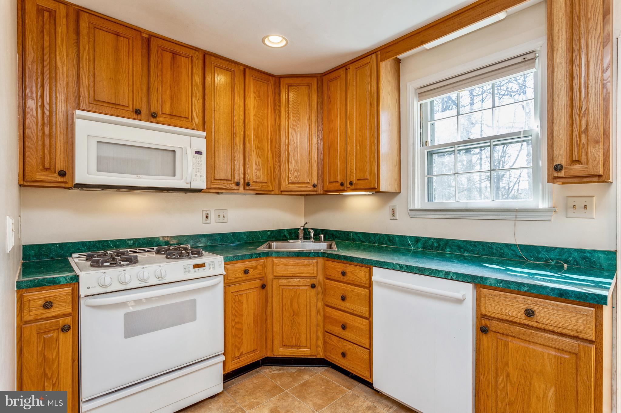 809 Eton Road Towson, MD 21204 - Photo 16 of 45 Kitchen with Gas Cooking and 42" Wall Cabinets