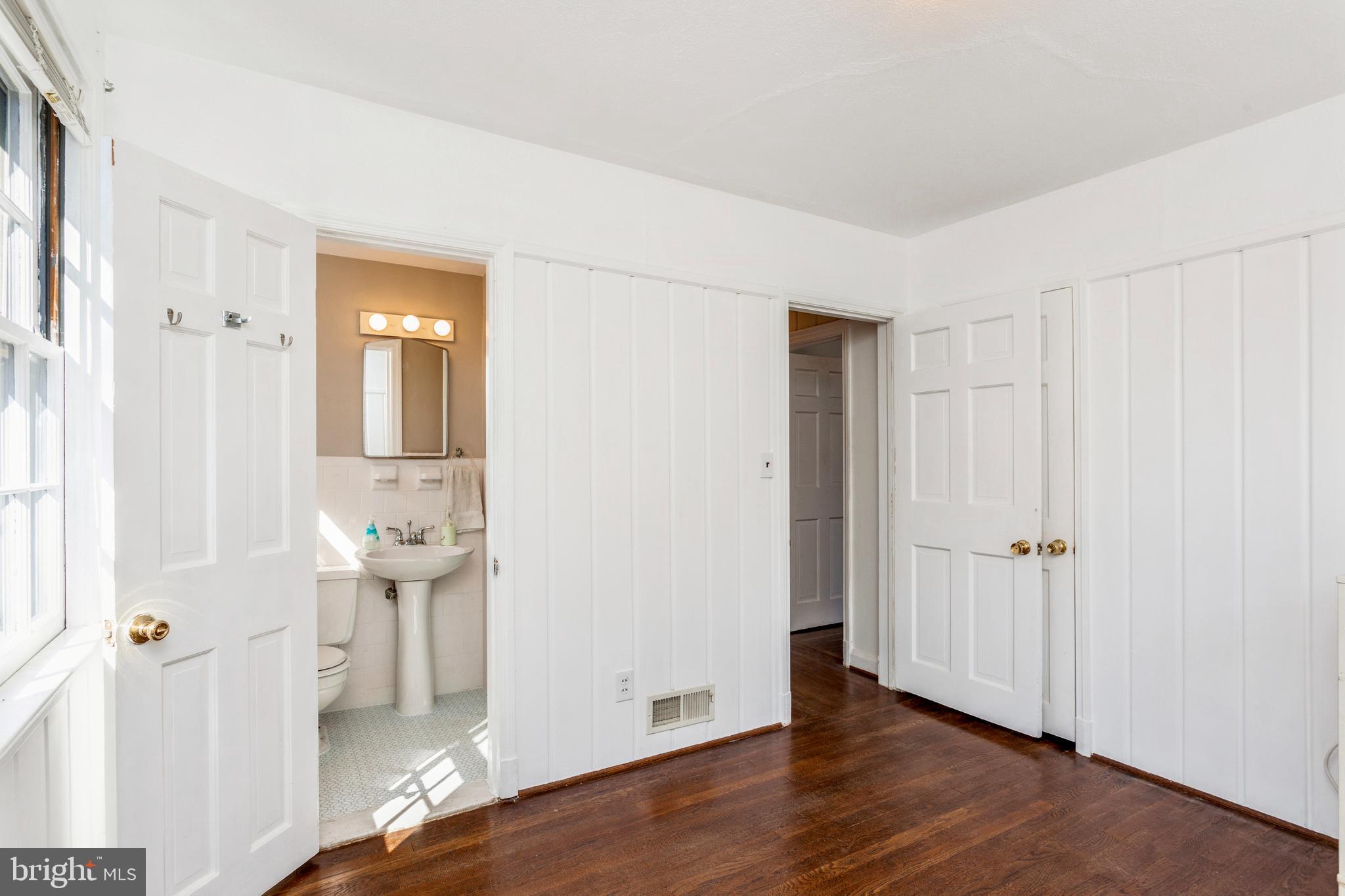 809 Eton Road Towson, MD 21204 - Photo 19 of 45 First Floor Bedroom with a Private Full Bath