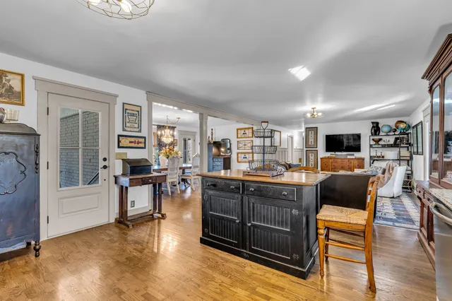 a room that has a couch and a stove in it