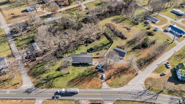 an aerial view of residential house with outdoor space