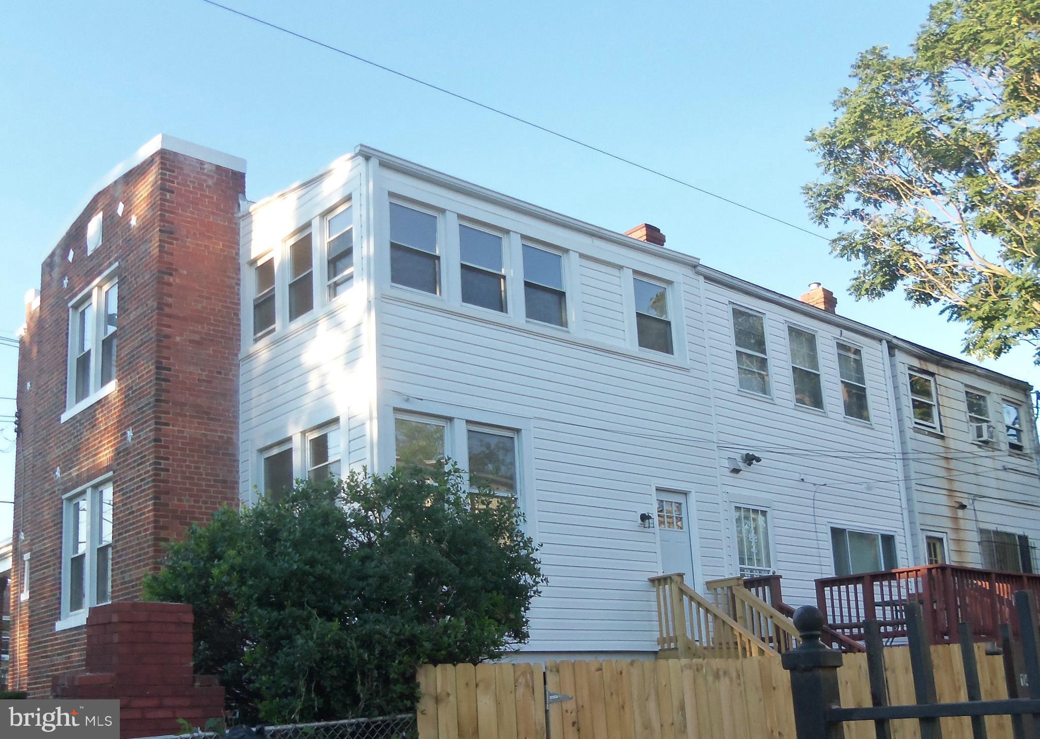 1401 Ridge Place Southeast Washington, DC 20020 - Photo 4 of 23 Exterior rear has new vinyl siding!