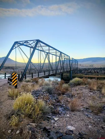 a view of an ocean and mountain