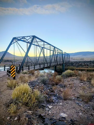 a view of an ocean and mountain