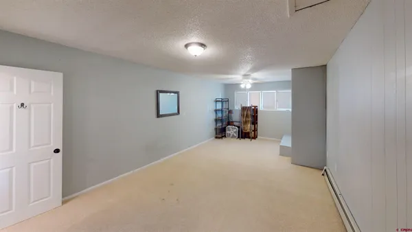 a view of a livingroom with a furniture