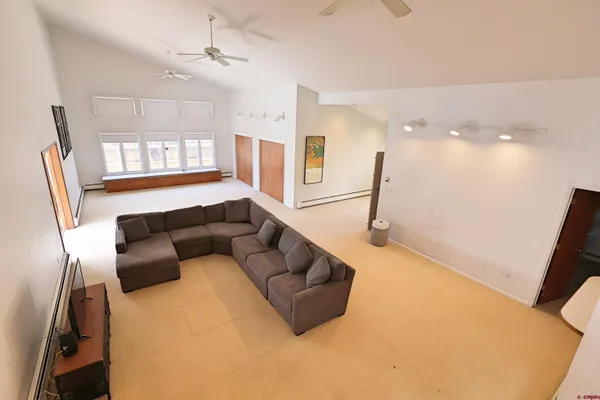 a living room with furniture and a window