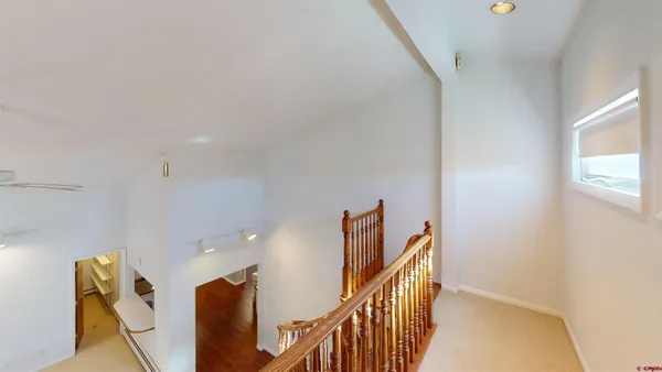 a view of a hallway with workspace