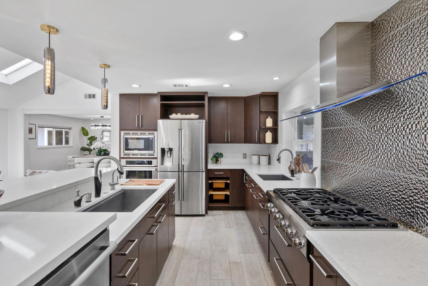 1999 Scott Lane Los Altos, CA 94024 - Photo 14 of 44 a kitchen with stainless steel appliances granite countertop a sink stove and refrigerator