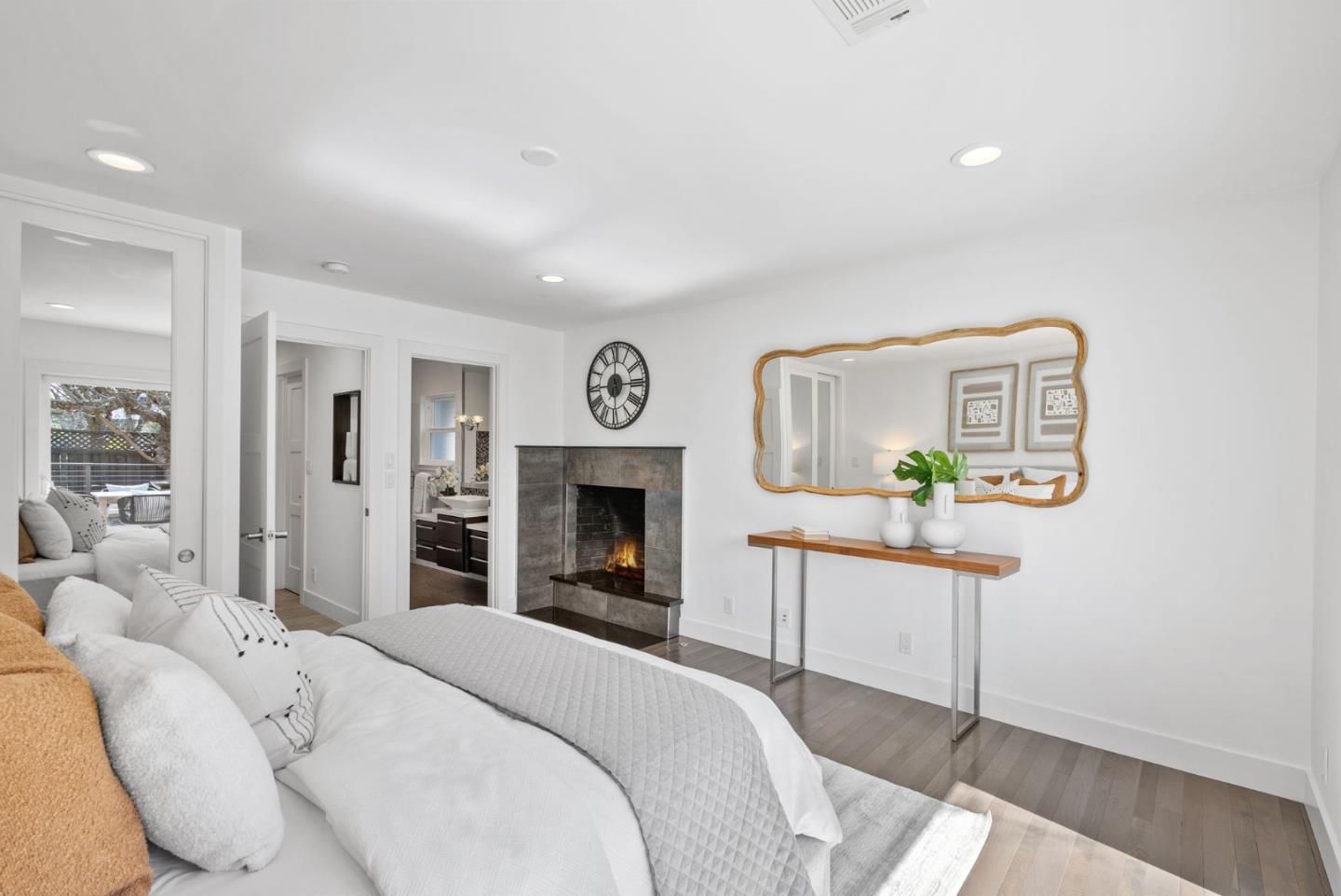 1999 Scott Lane Los Altos, CA 94024 - Photo 16 of 44 a spacious bedroom with a bed and a dresser