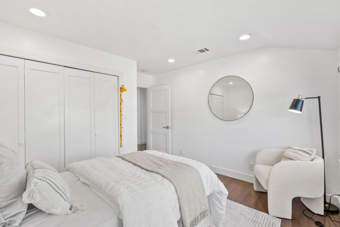 1999 Scott Lane Los Altos, CA 94024 - Photo 17 of 44 a bedroom with a bed and a chandelier