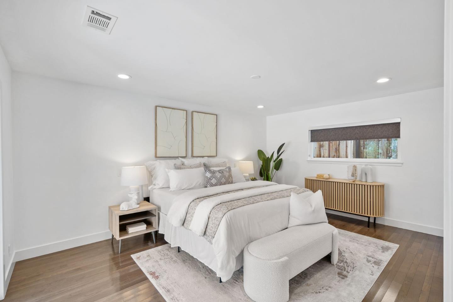 1999 Scott Lane Los Altos, CA 94024 - Photo 20 of 44 a bedroom with a bed and a table