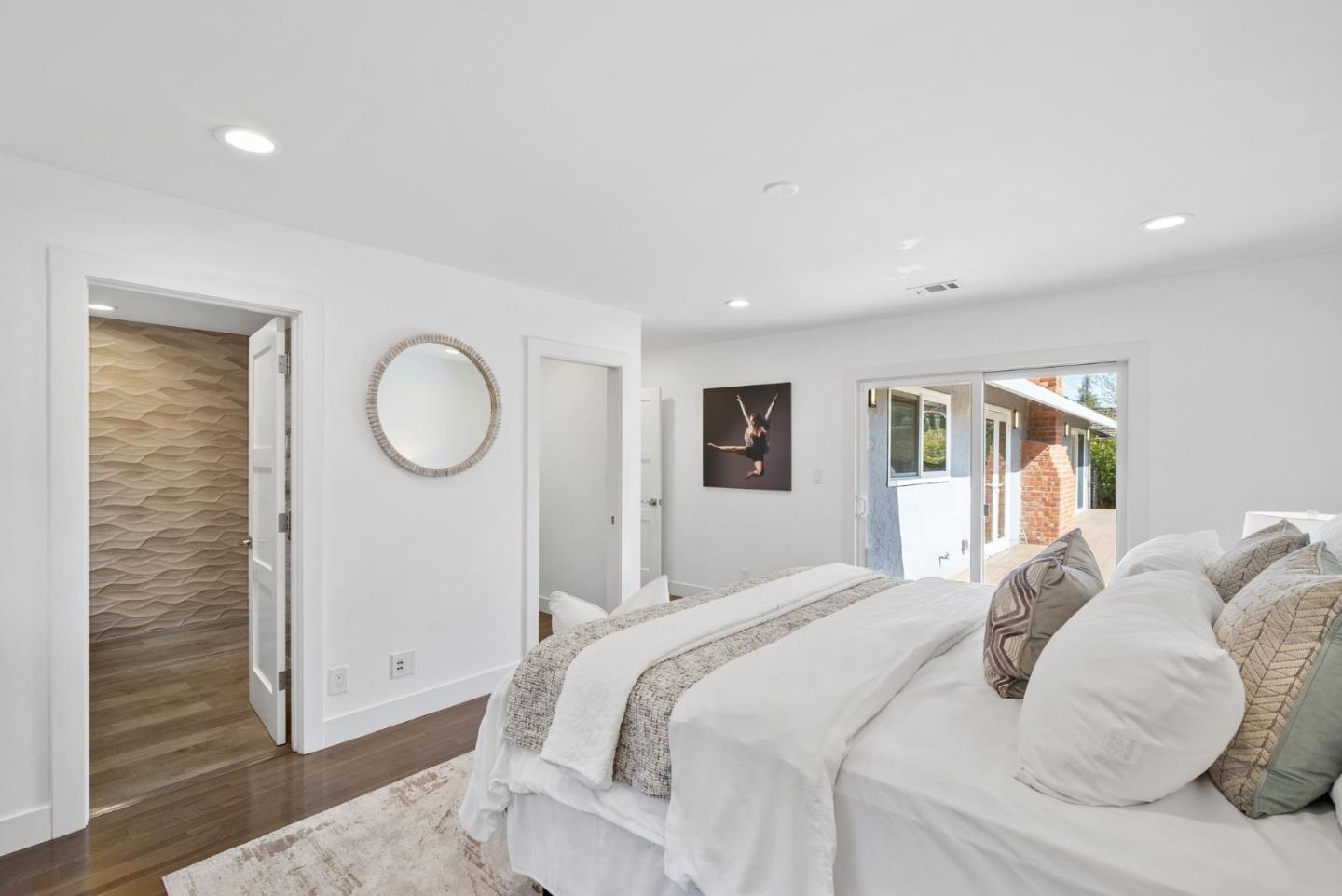 1999 Scott Lane Los Altos, CA 94024 - Photo 22 of 44 a bedroom with a large bed and a window