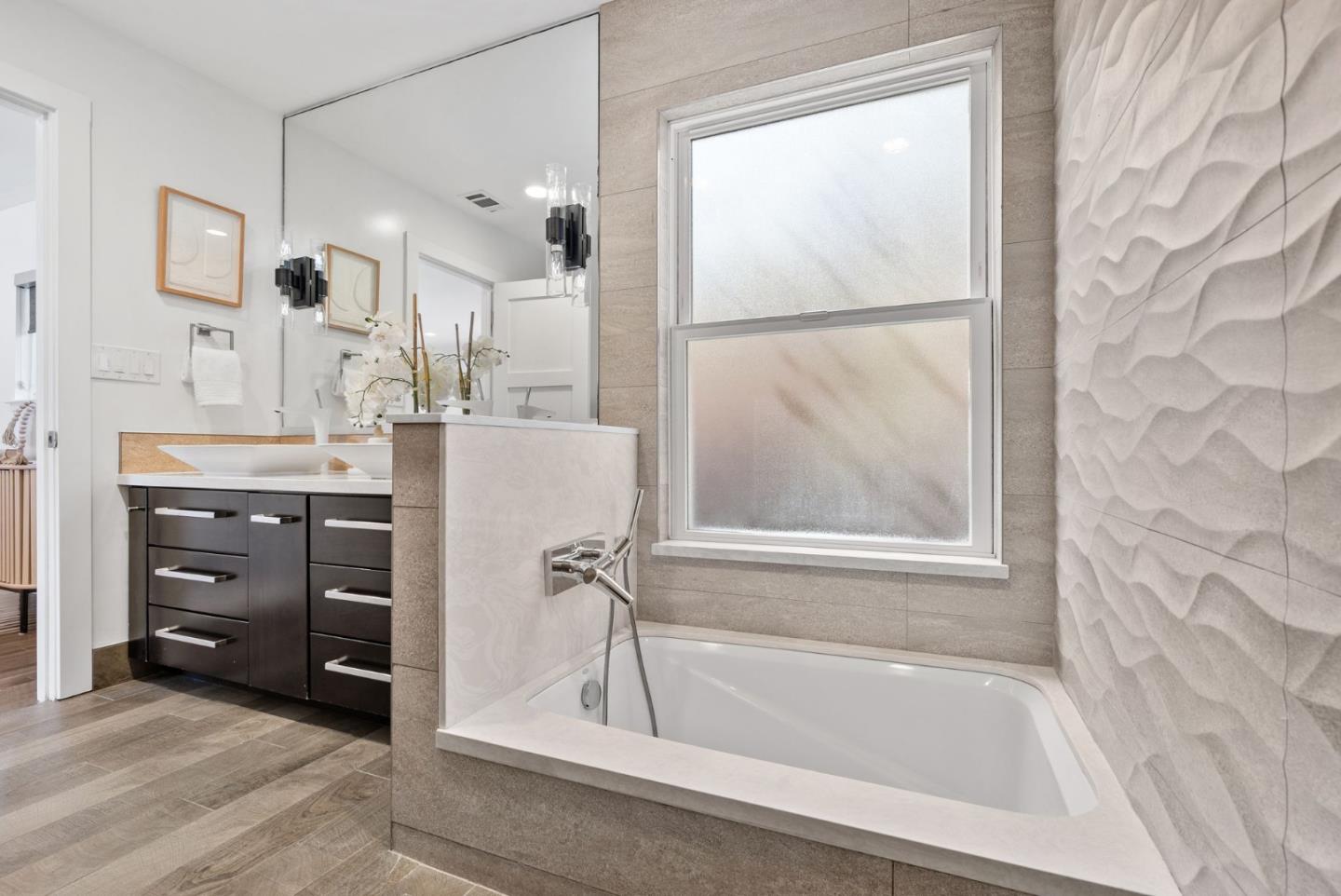 1999 Scott Lane Los Altos, CA 94024 - Photo 30 of 44 a bathroom with a tub sink and mirror