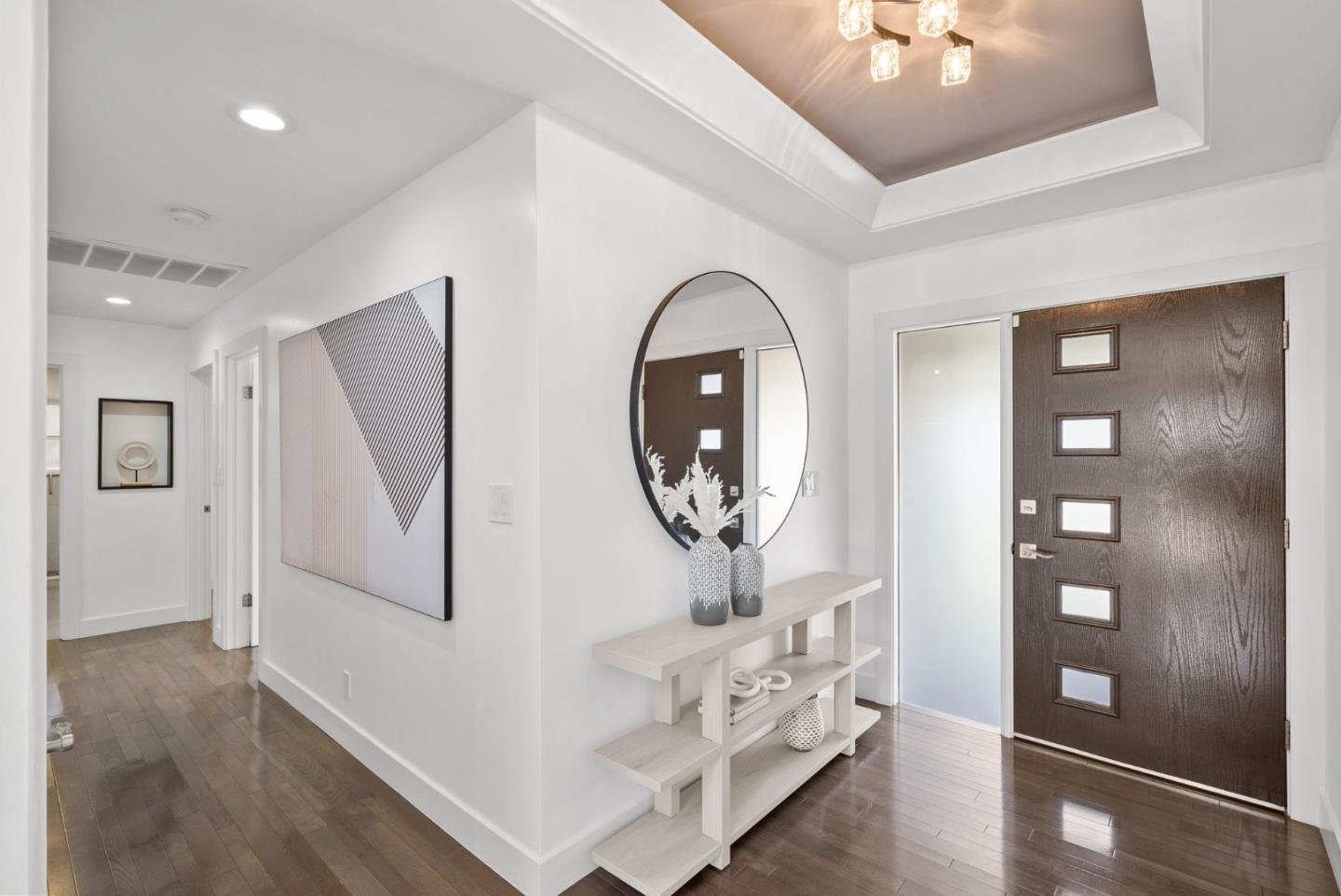 1999 Scott Lane Los Altos, CA 94024 - Photo 3 of 44 a view of a livingroom with furniture and wooden floor