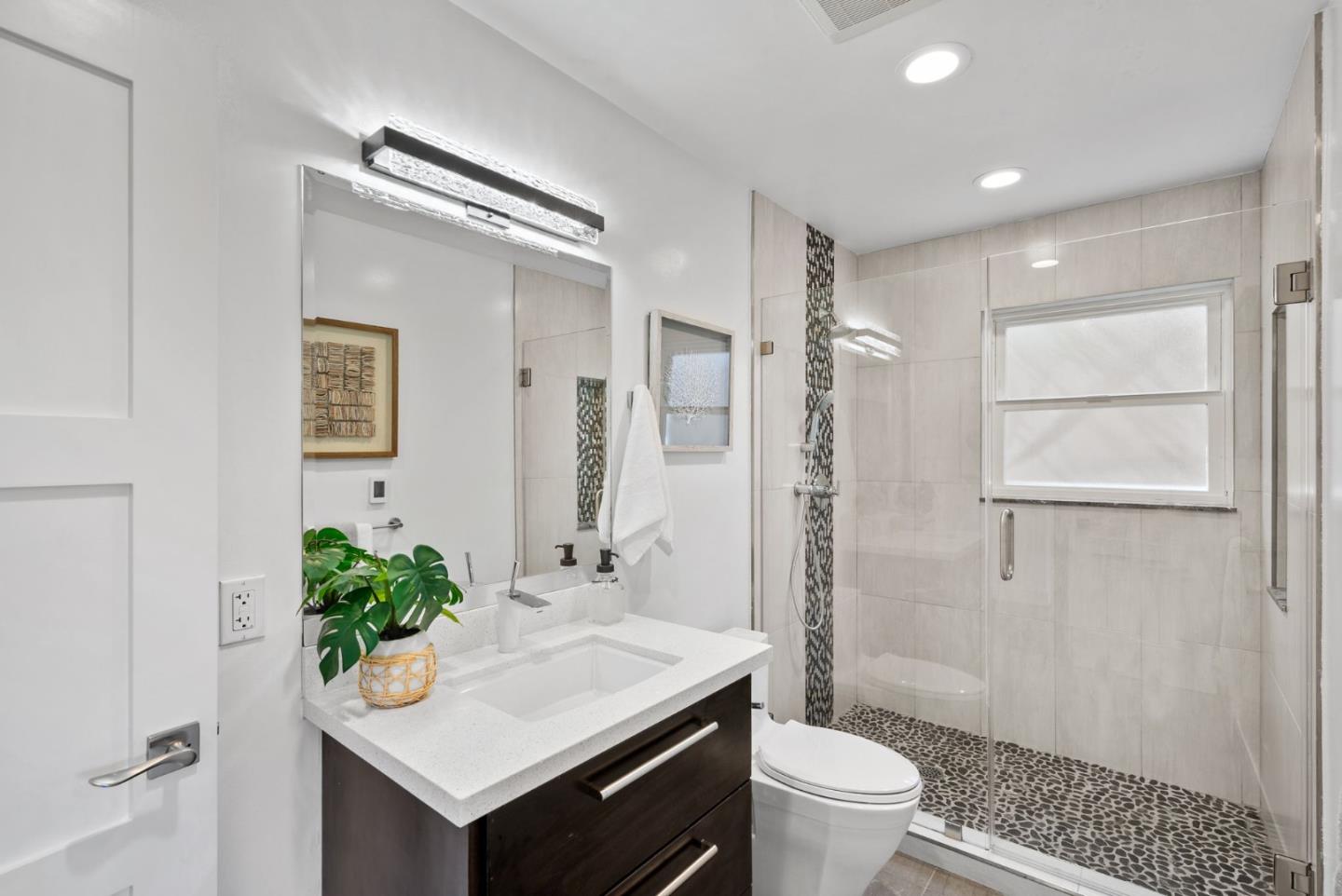 1999 Scott Lane Los Altos, CA 94024 - Photo 31 of 44 a bathroom with a sink a toilet and shower