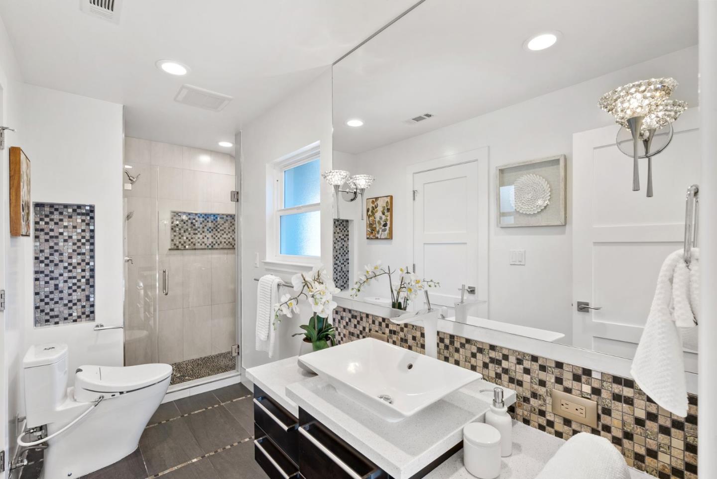 1999 Scott Lane Los Altos, CA 94024 - Photo 32 of 44 a bathroom with a sink a toilet and shower