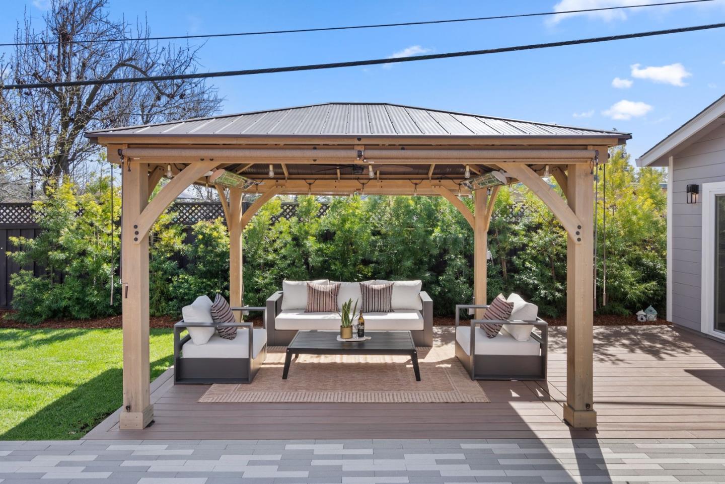 1999 Scott Lane Los Altos, CA 94024 - Photo 36 of 44 a view of a patio with a dining table and chairs