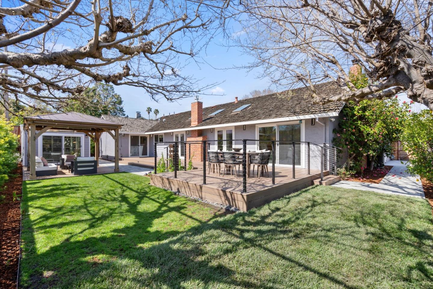 1999 Scott Lane Los Altos, CA 94024 - Photo 42 of 44 a view of a house with backyard porch and sitting area