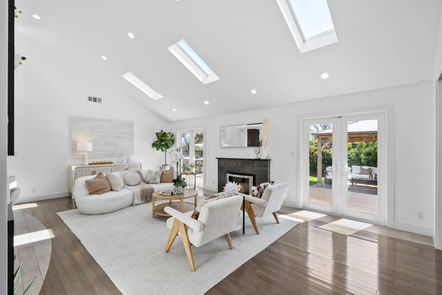 1999 Scott Lane Los Altos, CA 94024 - Photo 5 of 44 a living room with furniture and a fireplace