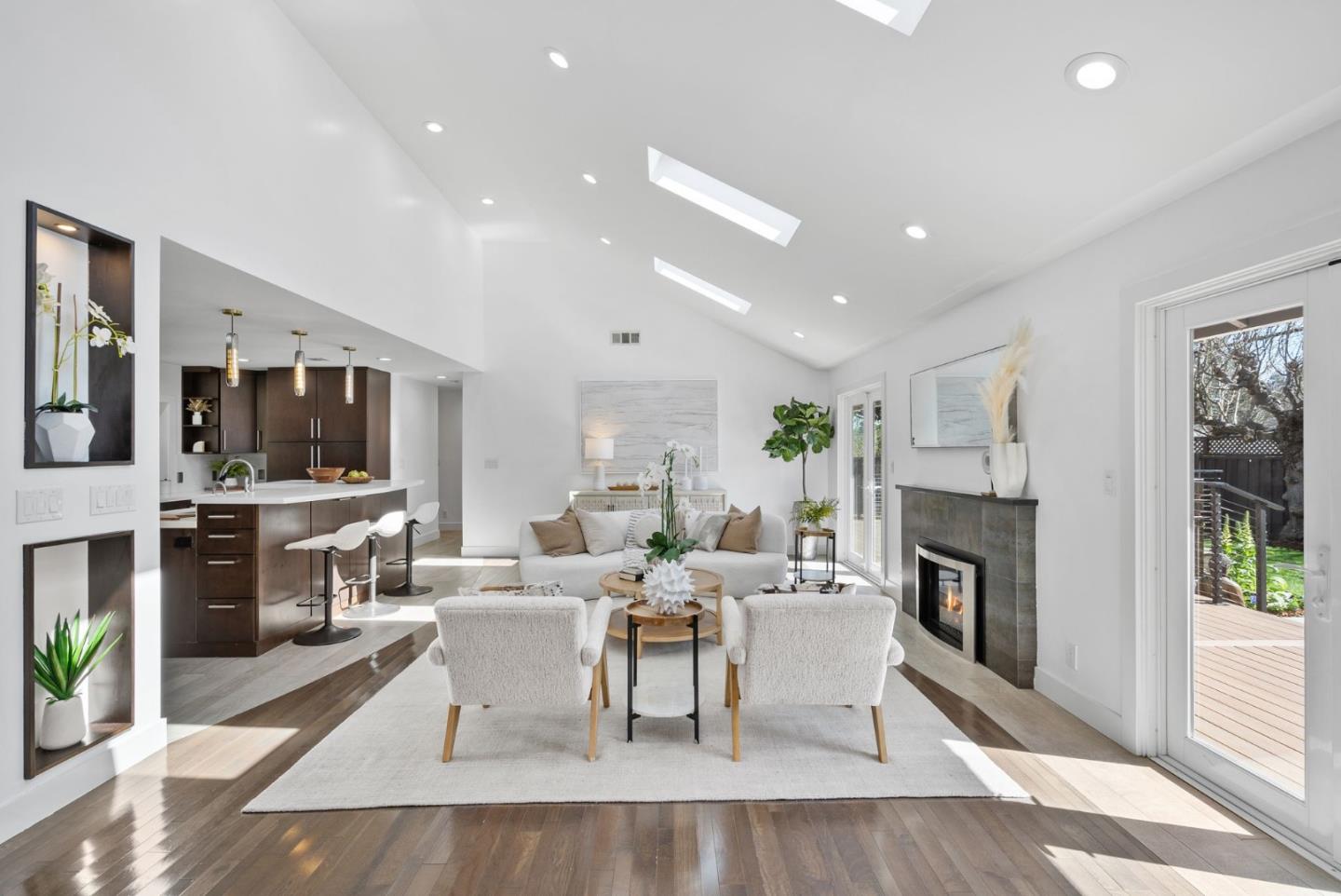 1999 Scott Lane Los Altos, CA 94024 - Photo 6 of 44 a living room with furniture fireplace and a table