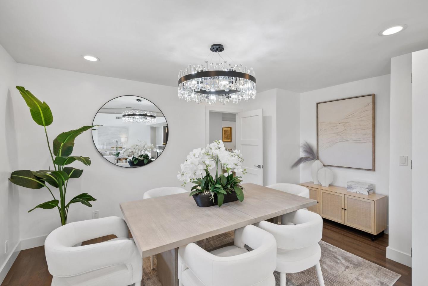 1999 Scott Lane Los Altos, CA 94024 - Photo 9 of 44 a dining room with furniture potted plants and wooden floor
