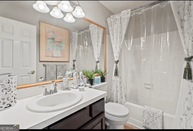 a potted plant sitting in front of a house