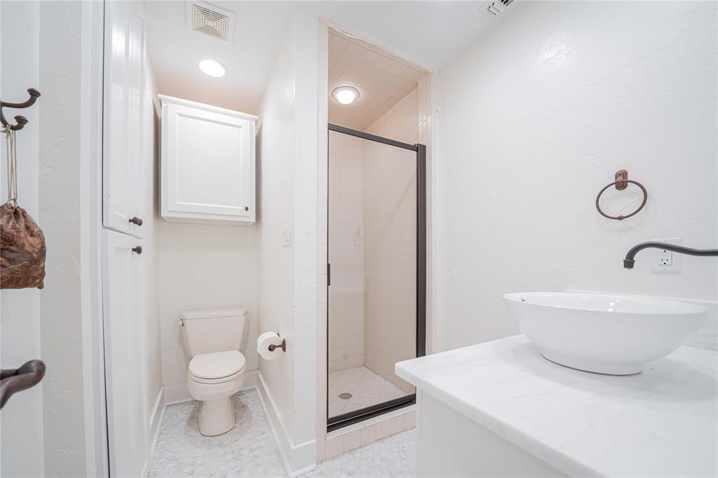 582 Windy Point Mount Vernon, TX 75457 - Photo 27 of 38 Full bathroom featuring a shower stall and vanity