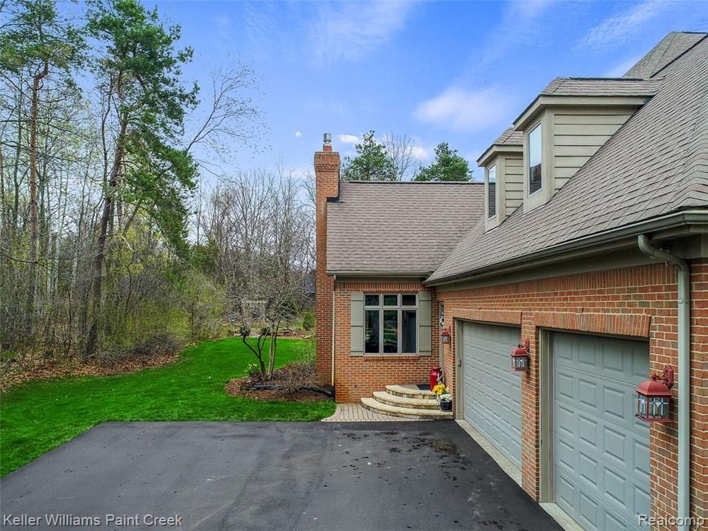 3-Car Garage and side entrance to the Mud Room.