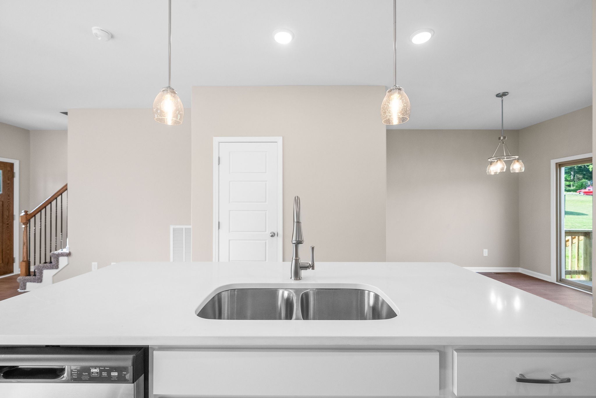 106 Colson Road Dover, TN 37058 - Photo 9 of 26 a kitchen with a sink a counter space and a window