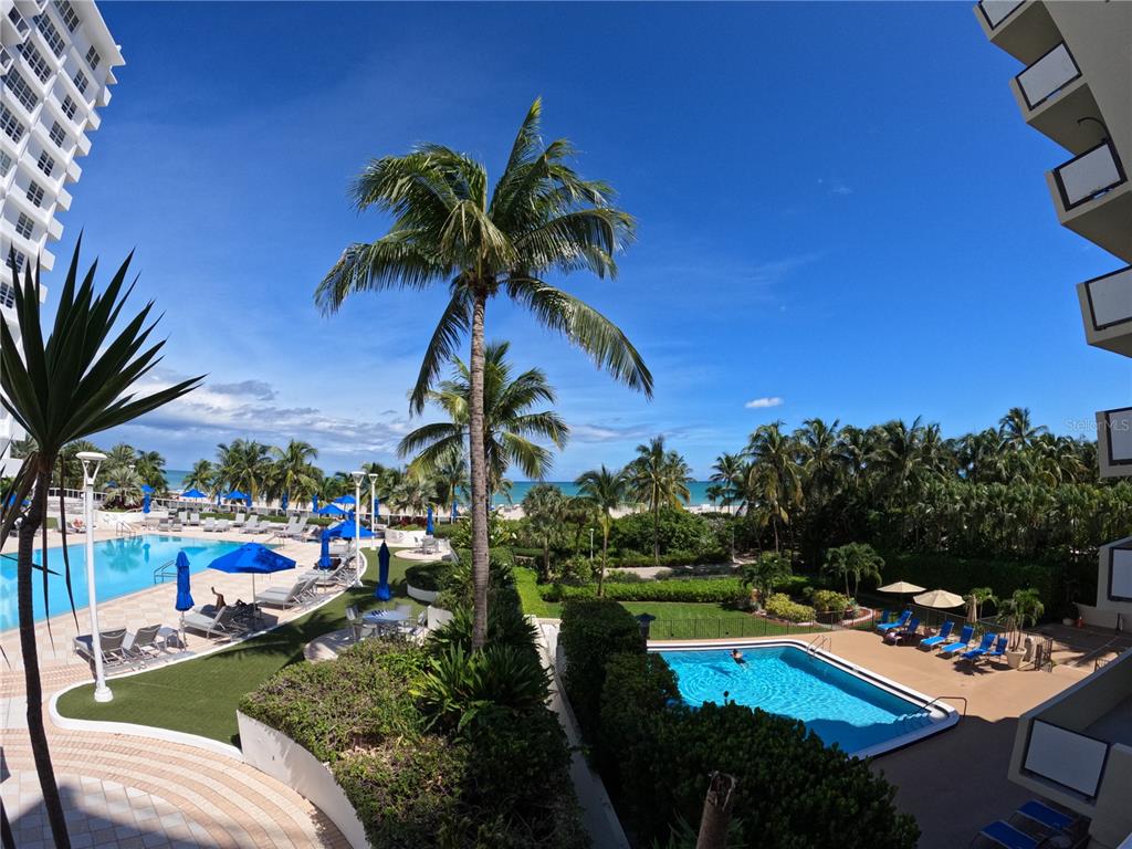100 Lincoln Road, Unit 332 Miami Beach, FL 33139 - Photo 3 of 14 a view of swimming pool with outdoor seating and a terrace