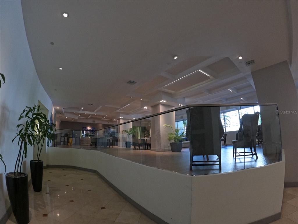100 Lincoln Road, Unit 332 Miami Beach, FL 33139 - Photo 5 of 14 a view of a lobby with black carpet