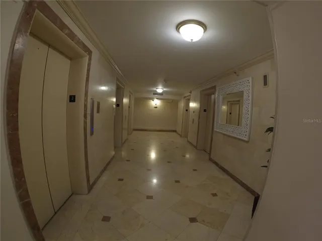 a view of a living room and window