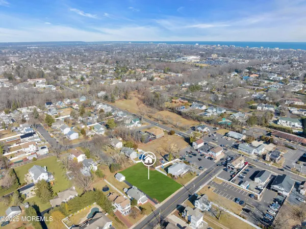 an aerial view of residential building with parking space