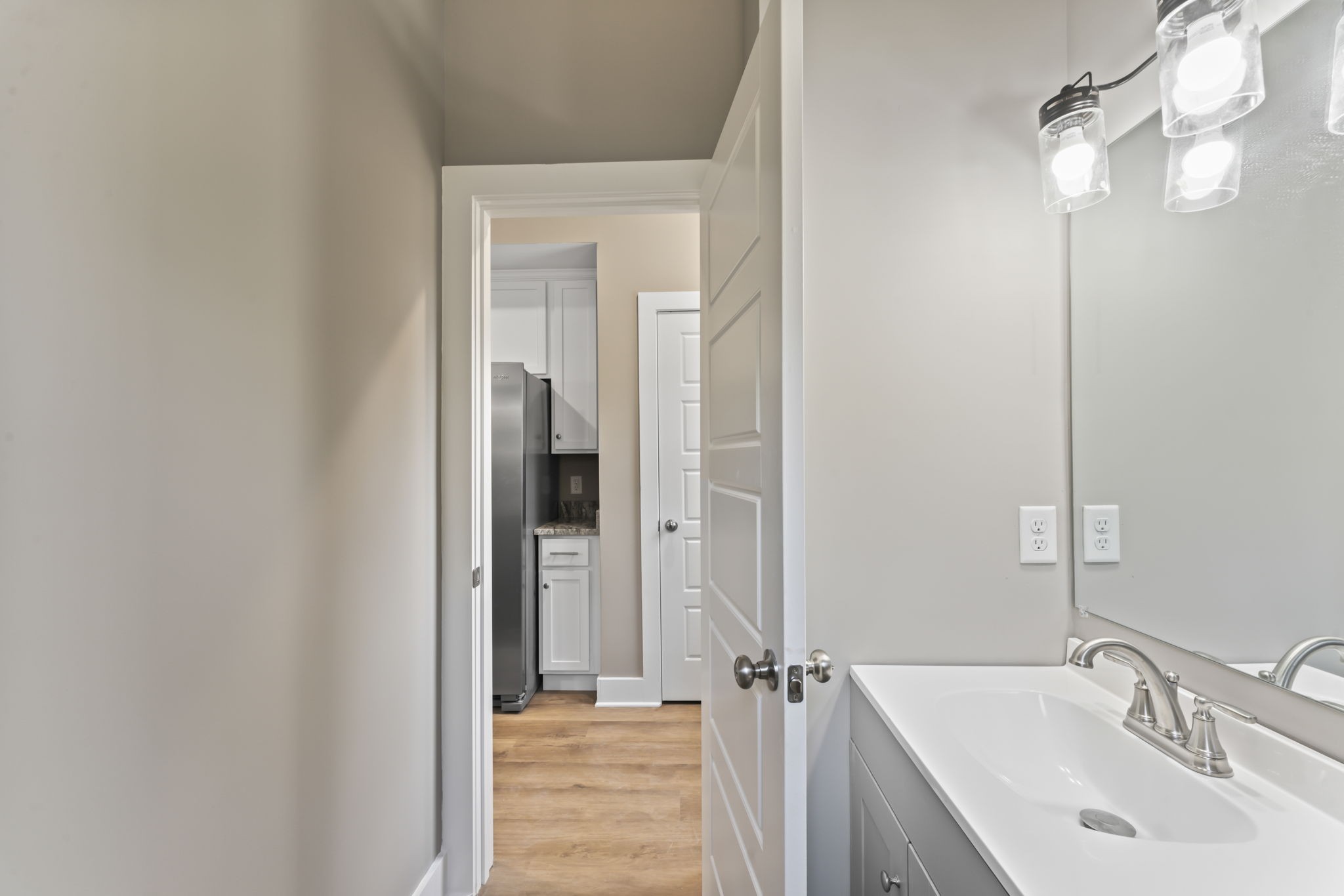 4357 Surji Circle Centerville, TN 37033 - Photo 14 of 25 a bathroom with a sink and a mirror
