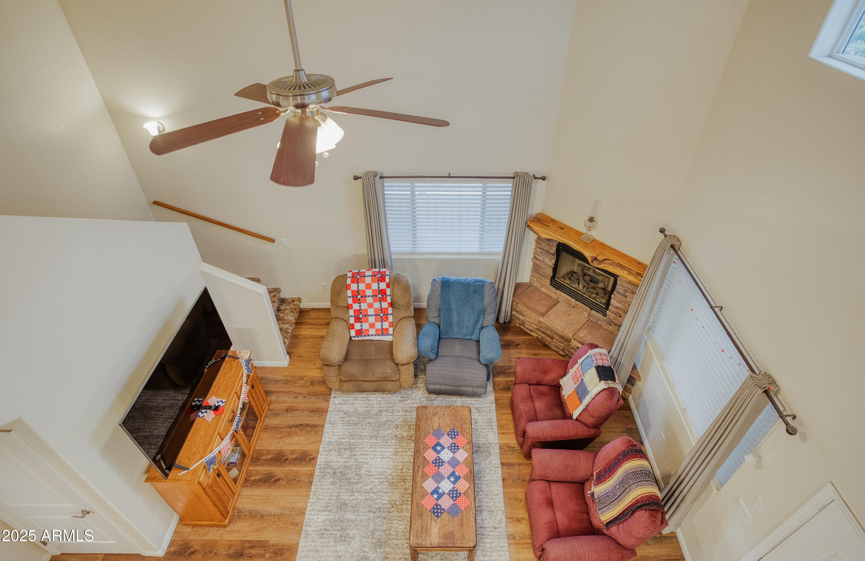 540 Rim Drive Show Low, AZ 85901 - Photo 12 of 35 a living room with furniture and a ceiling fan