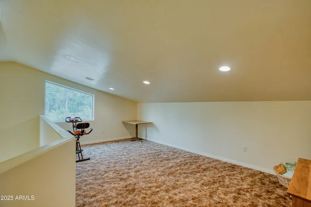 a view of a kitchen from the hallway