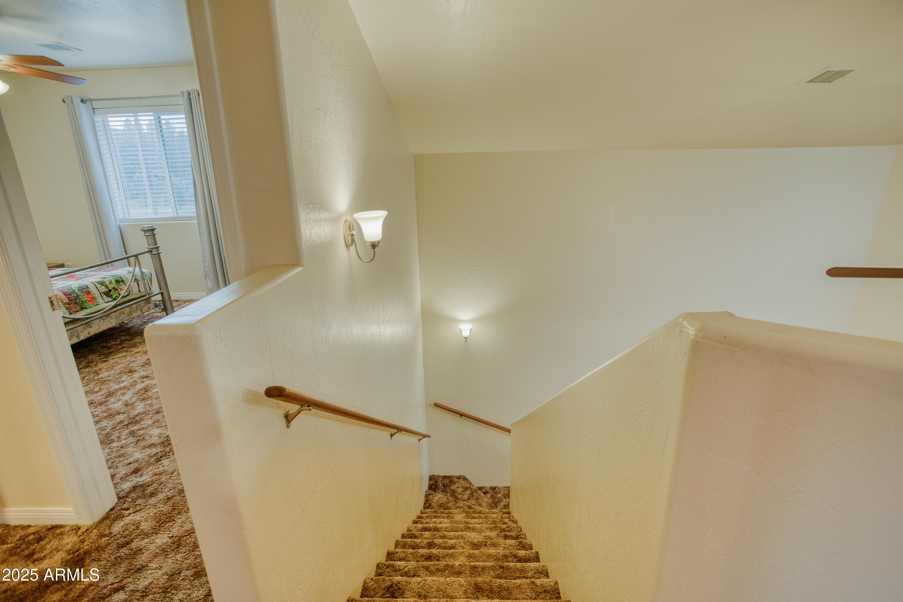 540 Rim Drive Show Low, AZ 85901 - Photo 19 of 35 a view of a hallway with workspace