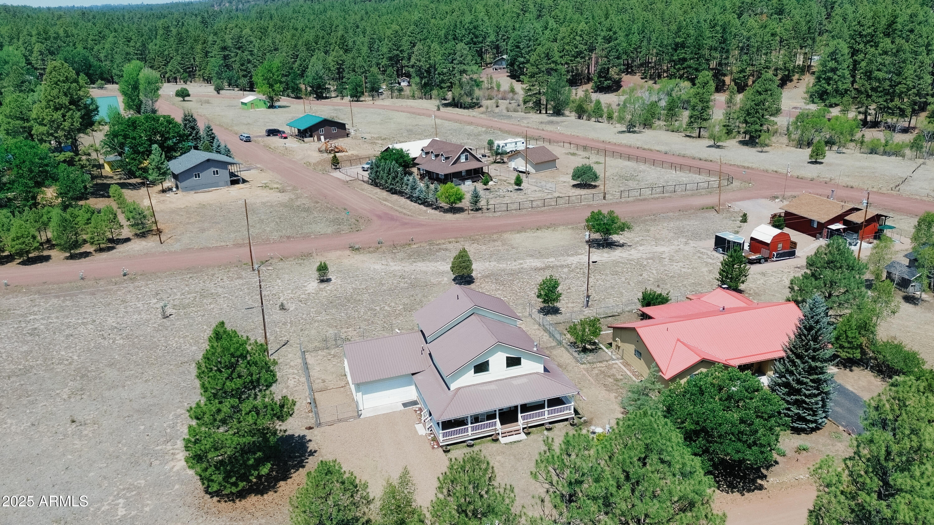 540 Rim Drive Show Low, AZ 85901 - Photo 27 of 35 an aerial view of a house with outdoor space