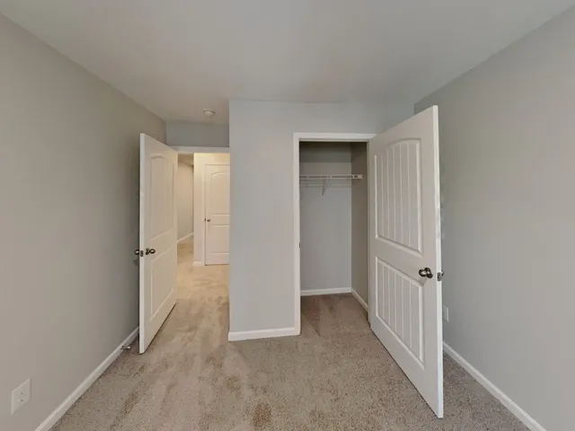 a view of a livingroom with wooden floor