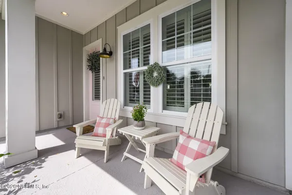 a room with furniture and a wooden floor