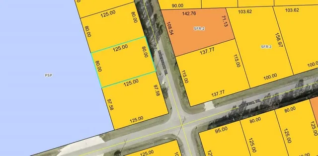 a view of a blue wall with a large window