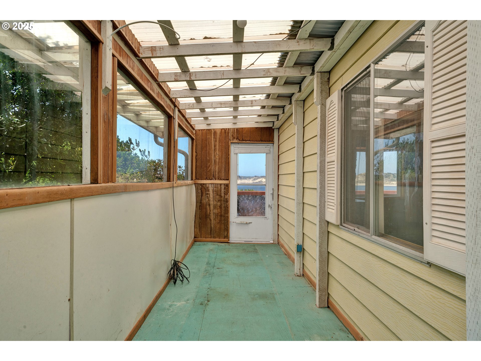 1601 Rhododendron Drive, Unit 610 Florence, OR 97439 - Photo 39 of 48 a view of a porch