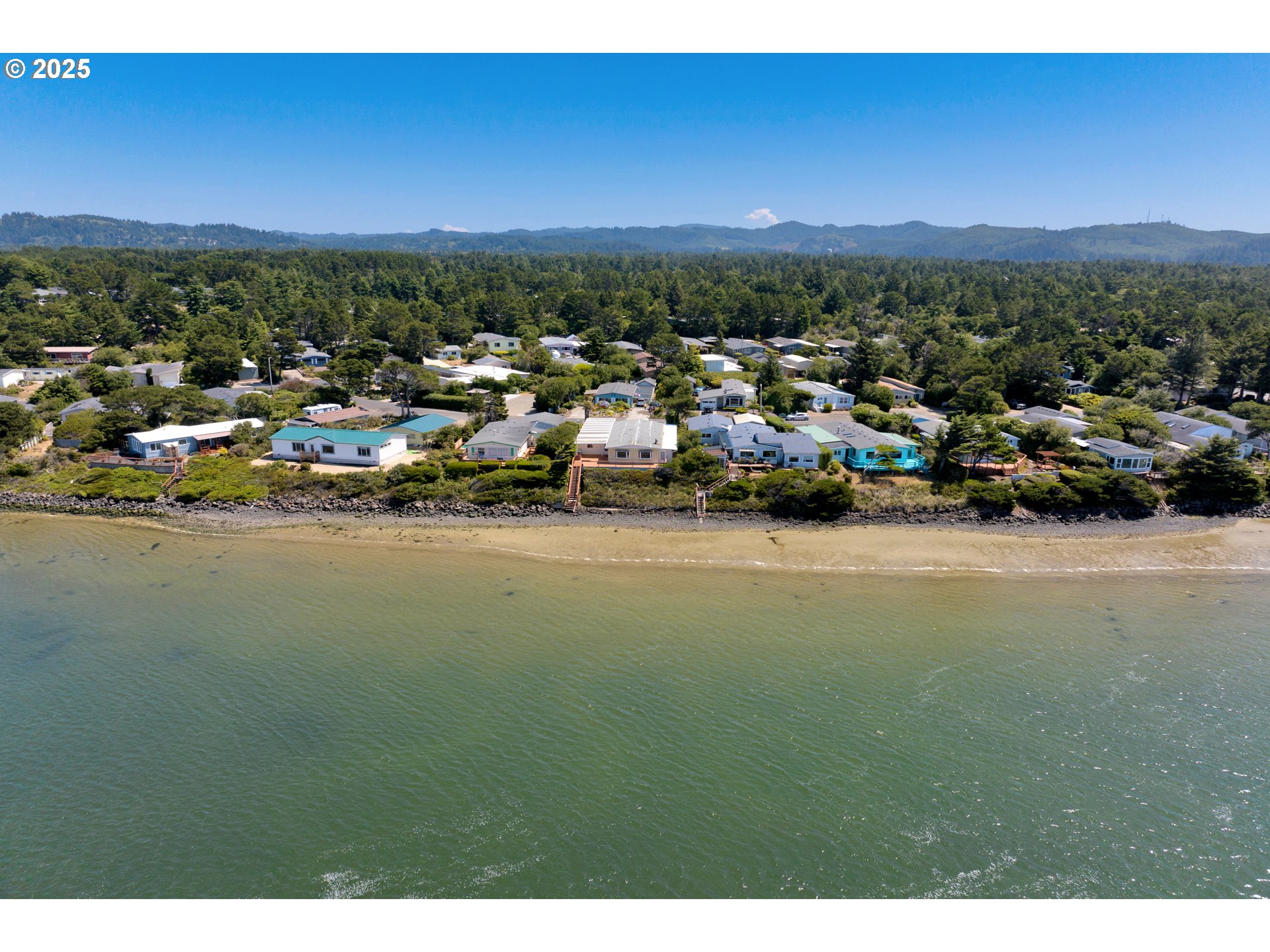 1601 Rhododendron Drive, Unit 610 Florence, OR 97439 - Photo 4 of 48 a view of city and ocean