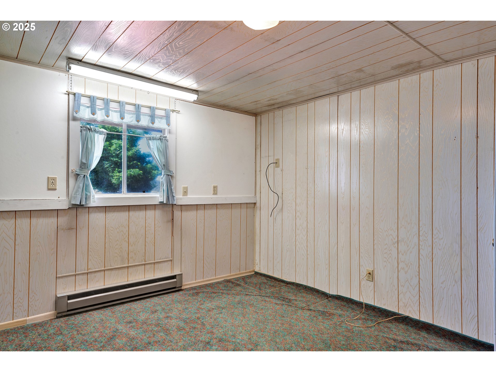 1601 Rhododendron Drive, Unit 610 Florence, OR 97439 - Photo 42 of 48 a view of an empty room with a window