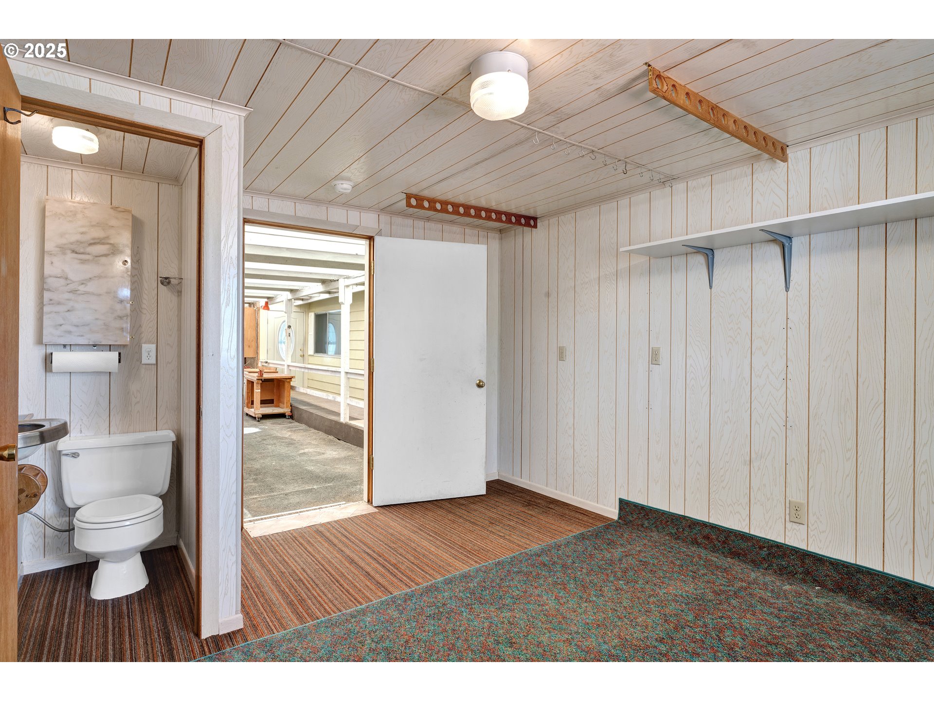 1601 Rhododendron Drive, Unit 610 Florence, OR 97439 - Photo 43 of 48 a view of an empty room and bathroom
