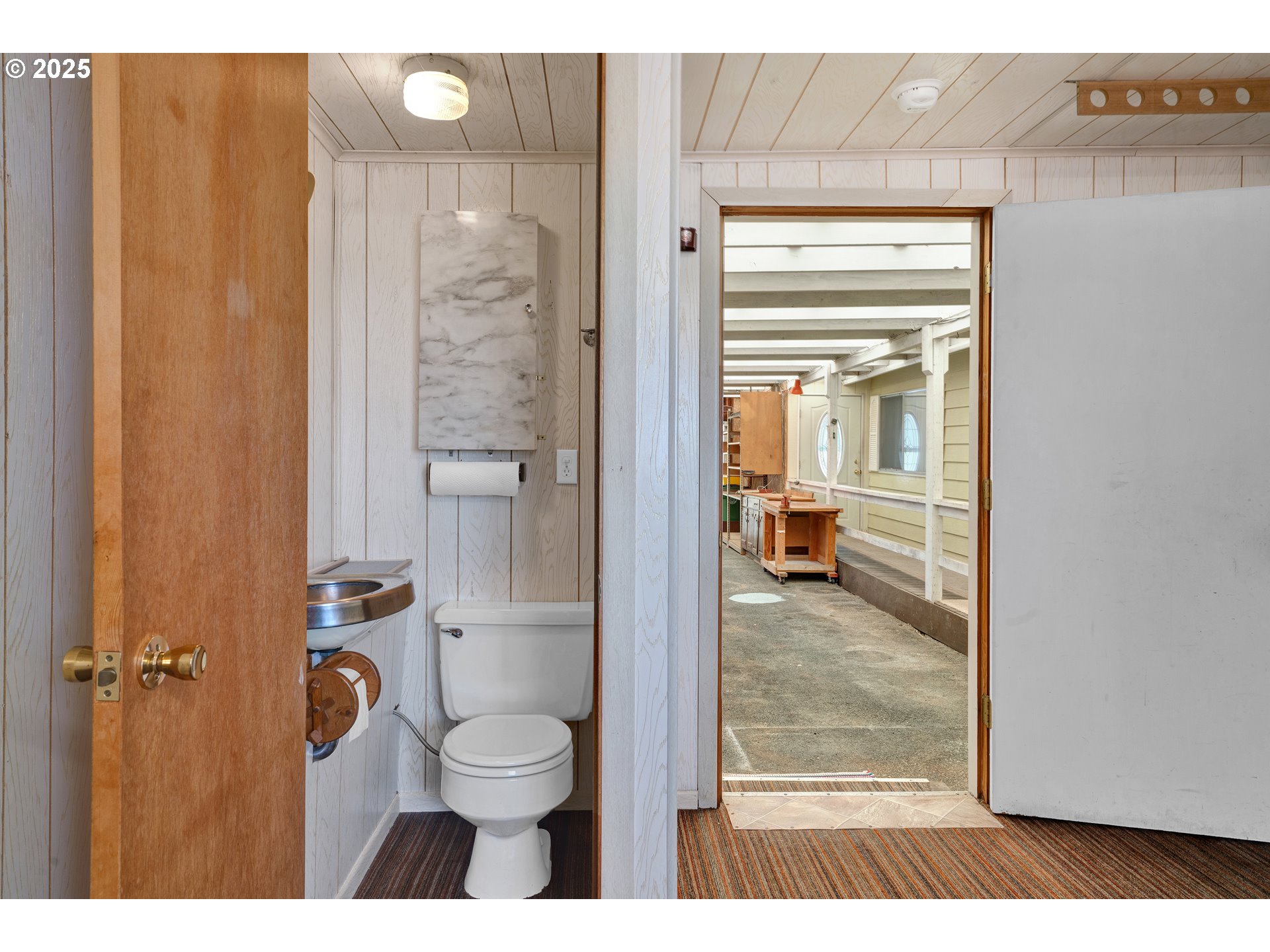1601 Rhododendron Drive, Unit 610 Florence, OR 97439 - Photo 44 of 48 a bathroom with a granite countertop shower curtain