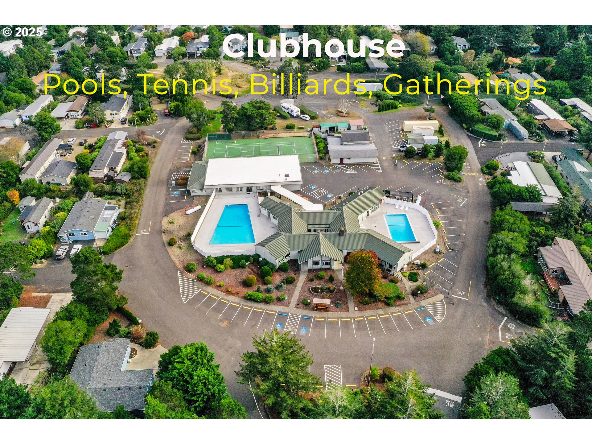 1601 Rhododendron Drive, Unit 610 Florence, OR 97439 - Photo 48 of 48 an aerial view of a house a yard and outdoor seating