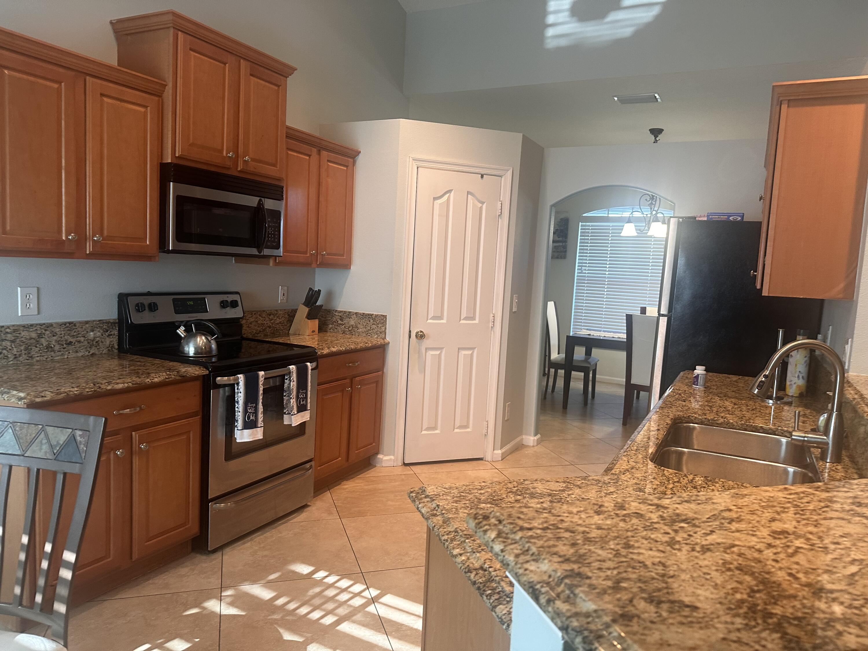 585 Southwest Undallo Road Port St. Lucie, FL 34953 - Photo 6 of 18 Kitchen